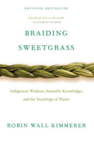 Cover of the book "braiding sweetgrass" by robin wall kimmerer, featuring a braided green plant against a white background with a subtitle "indigenous wisdom, scientific knowledge, and the teachings of plants.