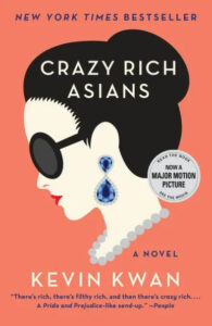 Book cover of "crazy rich asians" with a stylishly illustrated female silhouette adorned with luxurious jewels, showcasing the novel's theme of opulence and high society.