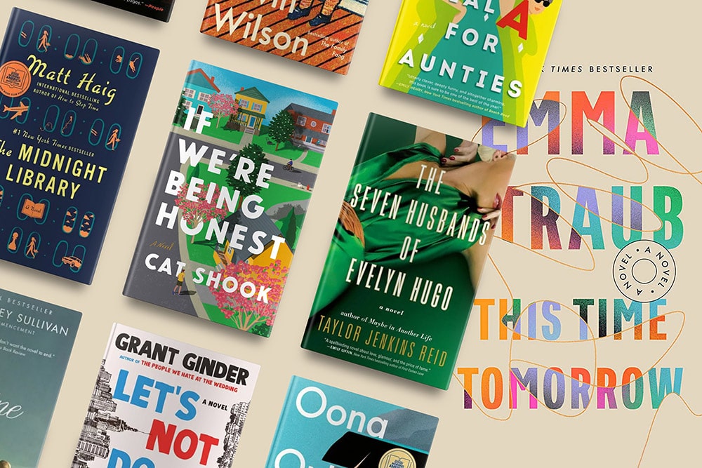 A collection of colorful book covers from various contemporary authors displayed in a dynamic arrangement, with one book open in the center, showcasing an engaging cover design.