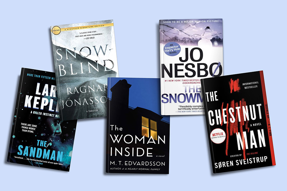 A collection of thrilling scandinavian crime novels spread out on a surface, inviting readers into a world of suspense and mystery.