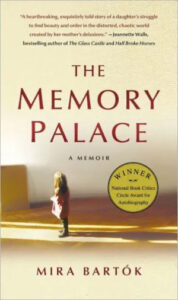 A young girl stands before a towering shelf of books, evoking a sense of wonder and the vast world of stories and memories within the pages, as depicted on the cover of "the memory palace," a memoir by mira bartók.