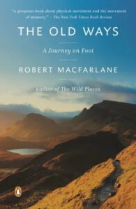 A serene landscape featuring rolling hills under a soft glowing sky, inspiring wanderlust and reflection, graces the cover of robert macfarlane's book "the old ways: a journey on foot.