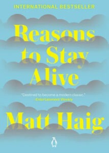 A book cover for "reasons to stay alive" by matt haig, with a stylized pattern of clouds in shades of yellow and blue and a small silhouette of a person at the bottom.