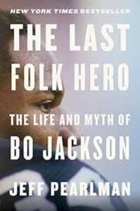 A book cover titled "the last folk hero: the life and myth of bo jackson" by jeff pearlman, portraying a profile view of bo jackson overlaid with the text.