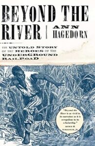 The cover of a book titled "beyond the river: the untold story of the heroes of the underground railroad" by ann hagedorn. it features an illustration of people moving stealthily through a densely wooded area, which conveys a feeling of a secretive journey or escape, fitting the theme of the underground railroad.