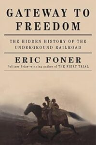 Book cover of 'gateway to freedom: the hidden history of the underground railroad' by eric foner, capturing the spirit of a clandestine journey to liberation.