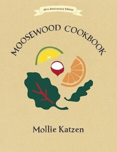 40th anniversary edition of the moosewood cookbook by mollie katzen - celebrating timeless vegetarian recipes with a colorful, iconic cover design featuring whimsical illustrations of vegetables and a slice of citrus.