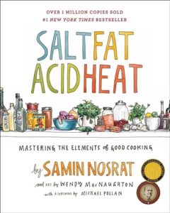 A colorful book cover illustration for "salt fat acid heat: mastering the elements of good cooking" by samin nosrat, with art by wendy macnaughton, featuring a variety of cooking ingredients and kitchen items, and accolades noting it as a #1 new york times bestseller with over 1 million copies sold.