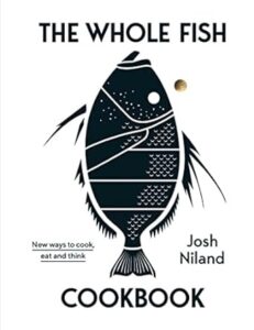 The whole fish cookbook by josh niland - cover featuring a stylized graphic of a fish composed of various cooking-related patterns, suggesting a comprehensive guide to cooking, eating, and thinking about fish.