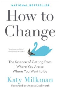 A book cover titled "how to change" by katy milkman with a graphic of a swan, symbolizing transformation and growth.