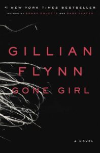 Gillian flynn: gone girl - a novel that twists and tangles mystery like the unravelling threads on its cover, a #1 new york times bestseller delving into sharp obsessions and dark places of the human psyche.