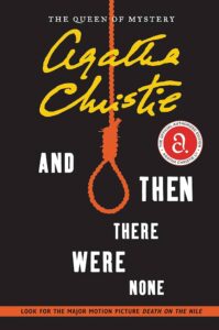 Book cover of "and then there were none" by agatha christie, featuring the title in bold white and orange letters with a looped rope forming the letter 'o' in 'none', set against a dark background. the cover also includes a tagline referring to agatha christie as "the queen of mystery" and a stamp indicating an upcoming major motion picture based on the novel.