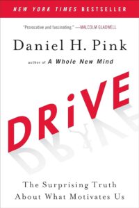 Cover of the book "drive: the surprising truth about what motivates us" by daniel h. pink, featuring bold red lettering on a white background with praise from malcolm gladwell.