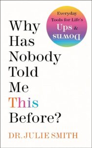 A book cover with the title "why has nobody told me this before?" by dr. julie smith, featuring a colorful design that suggests it's a self-help or personal development book with tools for everyday life's ups and downs.