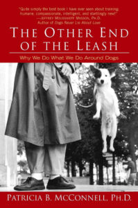 Book cover of "the other end of the leash" by patricia b. mcconnell, featuring a person standing with a dog jumping up towards them. text includes a positive review and the subtitle.