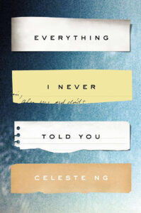 An artistic book cover design for "everything i never told you" by celeste ng, featuring a mix of typography on different colored paper scraps against a textured blue background.