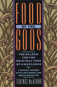 The image is a book cover for "Food of the Gods" by Terence McKenna. The background features illustrated mushrooms and grasses. The subtitle reads "The Search for the Original Tree of Knowledge: A Radical History of Plants, Drugs, and Human Evolution.