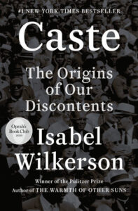 Cover of "Caste: The Origins of Our Discontents" by Isabel Wilkerson, featuring a black and white photo of a crowd.