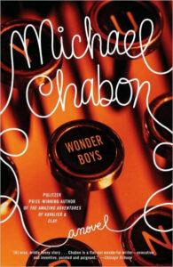 Book cover of "Wonder Boys" by Michael Chabon, featuring close-up image of typewriter keys and curly white text.