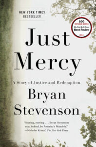 Cover of "Just Mercy" by Bryan Stevenson, featuring text and a tree in the background.