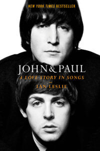Black and white cover with two men, "John & Paul: A Love Story in Songs" by Ian Leslie, in bold text.