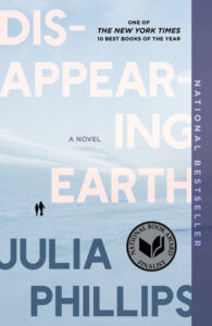 Cover of "Disappearing Earth" by Julia Phillips, showing two people walking in a snowy landscape. National bestseller label.