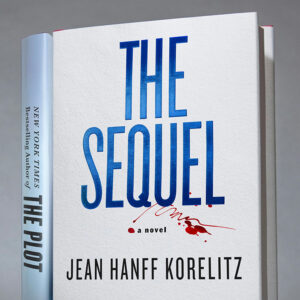 Close-up of the book "The Sequel" by Jean Hanff Korelitz with a white cover and bold blue title.