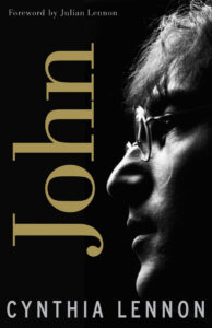 Profile of a man with glasses on a book cover titled "John" by Cynthia Lennon.