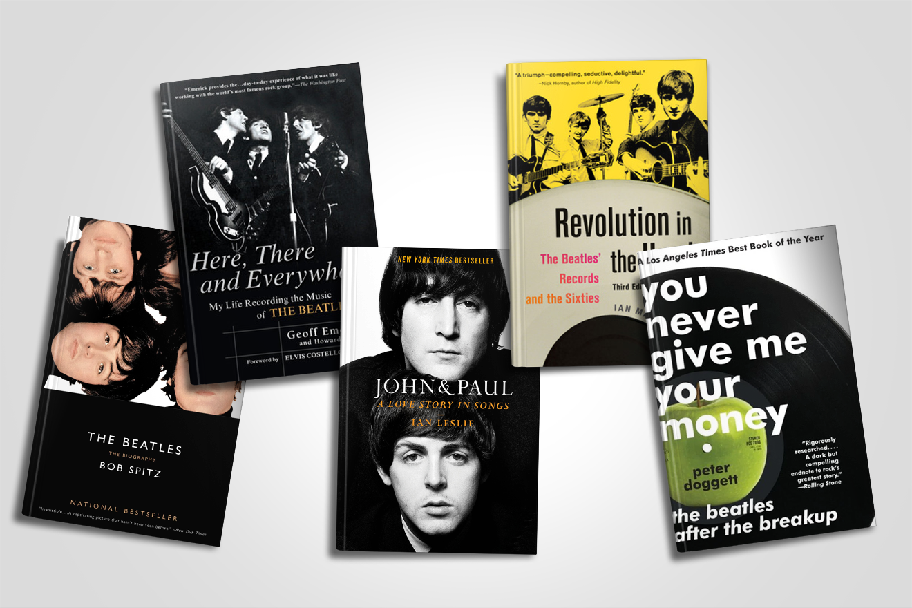 Five Beatles books are arranged on a light surface, featuring photos of the band on the covers.