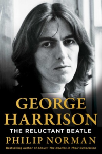 Black and white book cover featuring a man with long hair, titled "George Harrison: The Reluctant Beatle" by Philip Norman.