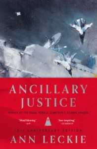 Abstract painting of spacecraft in space above the red cover text for Ann Leckie’s "Ancillary Justice.