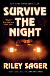 Book cover of "Survive the Night" with a car's headlights shining in the dark and bold glowing text.