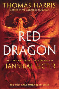 Book cover of "Red Dragon" by Thomas Harris, featuring a fiery dragon illustration and bold white and yellow text.