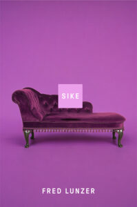 A purple chaise lounge on a purple background with "SIKE" and "FRED LUNZER" written on it.