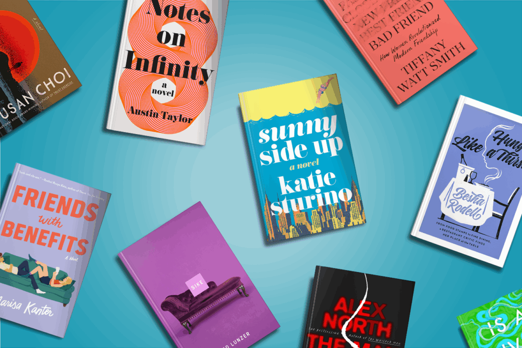 A flat lay of colorful book covers arranged on a blue background.