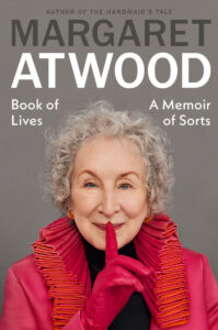 Margaret Atwood in a red outfit, holding a gloved finger to her lips, with her book title above.