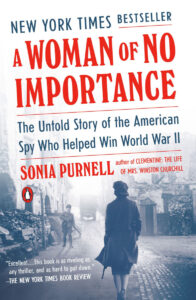 Book cover: "A Woman of No Importance" by Sonia Purnell, featuring a woman walking down a foggy street.