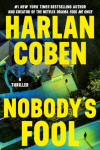 Aerial view of a suburban house at night with bold yellow text: "Harlan Coben NOBODY'S FOOL.