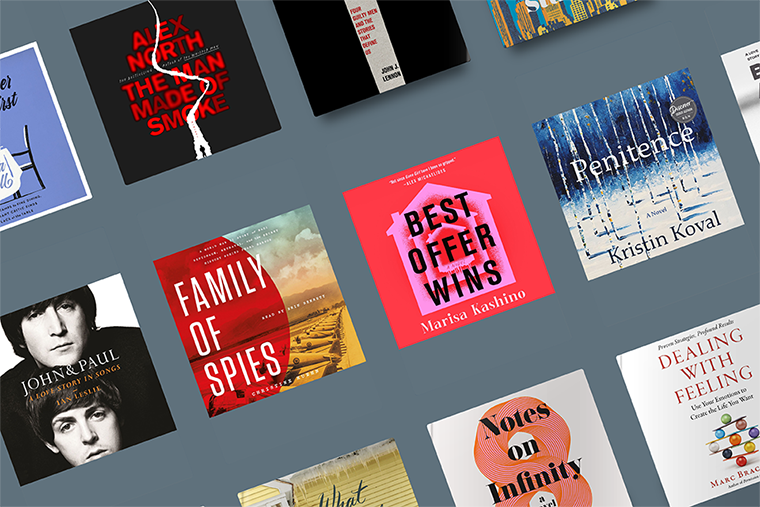 Flat lay of various audiobook covers displayed on a blue background.