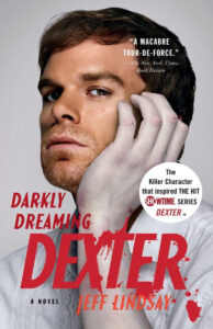 A man with a pensive expression rests his chin on his hand; "Darkly Dreaming Dexter" book cover.