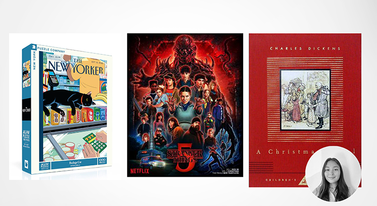 A puzzle, Stranger Things poster, and A Christmas Carol book cover with a woman's small photo in the corner.
