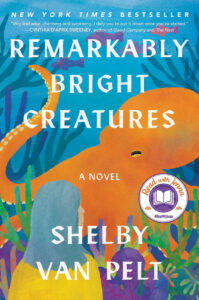 Illustrated book cover of "Remarkably Bright Creatures" showing a woman and an orange octopus underwater.