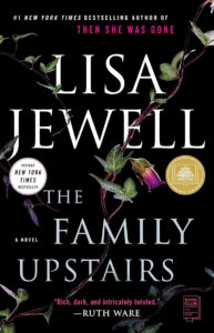 Book cover for "The Family Upstairs" by Lisa Jewell, with vines and purple flowers on a black background.