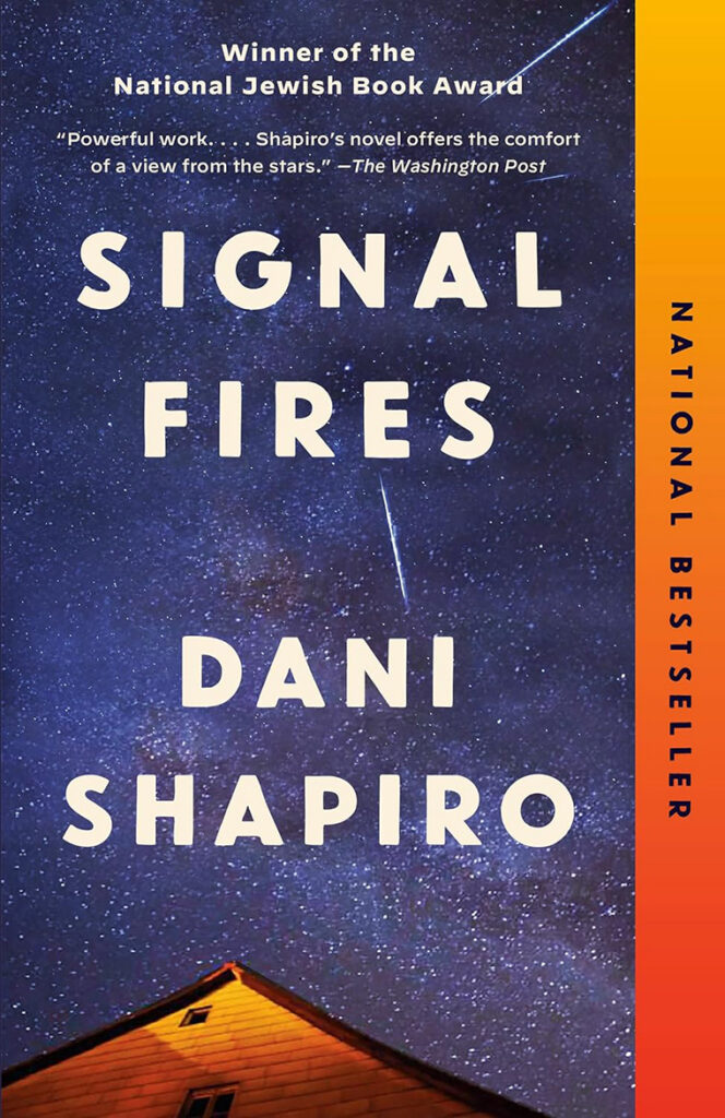 Book cover for "Signal Fires" by Dani Shapiro, featuring a starry night sky above a house, with shooting stars.