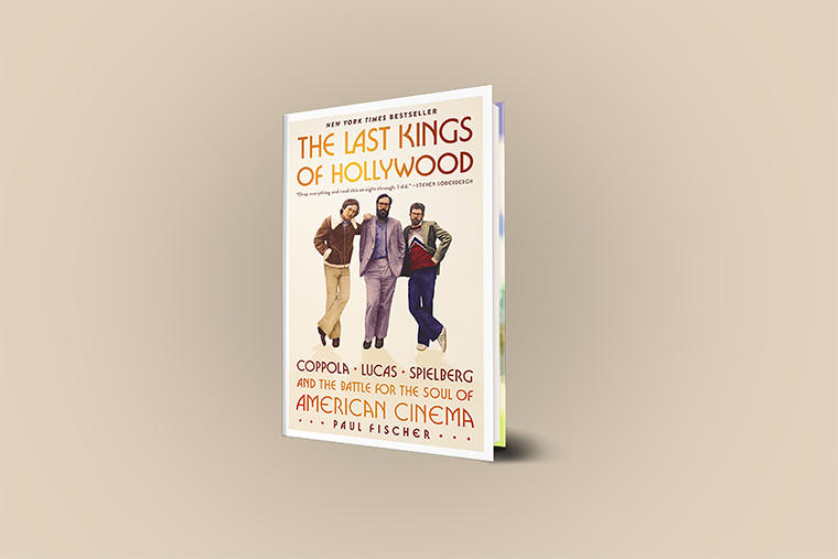 Book titled "The Last Kings of Hollywood" with illustrated figures on a plain beige background.