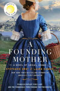 Woman in blue colonial dress holding basket of apples, with historical town and river in the background. Book cover.
