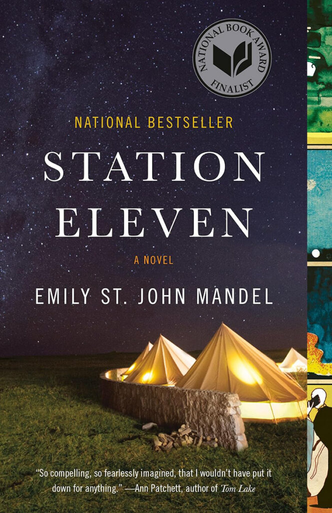 A starry night sky above lit tents; cover of "Station Eleven" by Emily St. John Mandel.