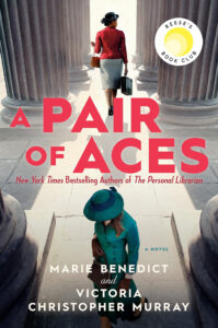 A woman in red walks away; a woman in teal sits and writes; book title "A Pair of Aces" in bold letters.