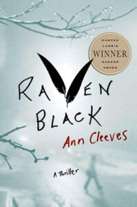 Book cover of “Raven Black” by Ann Cleeves, with black feather art and a winner award sticker.