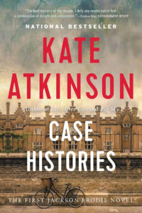 A bicycle lies in front of an old building on the cover of “Case Histories” by Kate Atkinson.